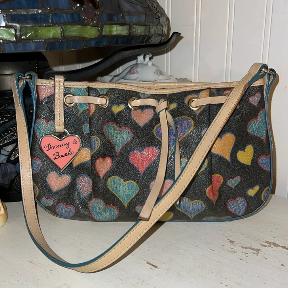 Dooney And Bourke small heart canvas & leather satchel purse